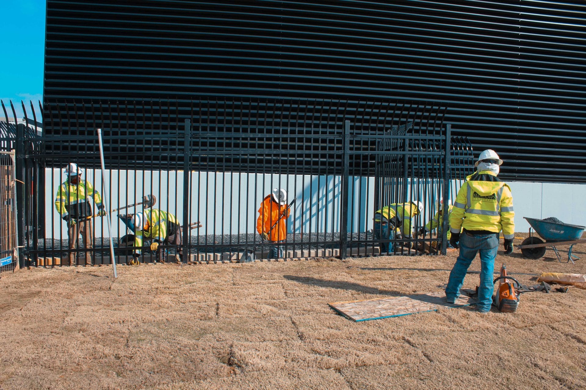 Hardscaping team working on paving
